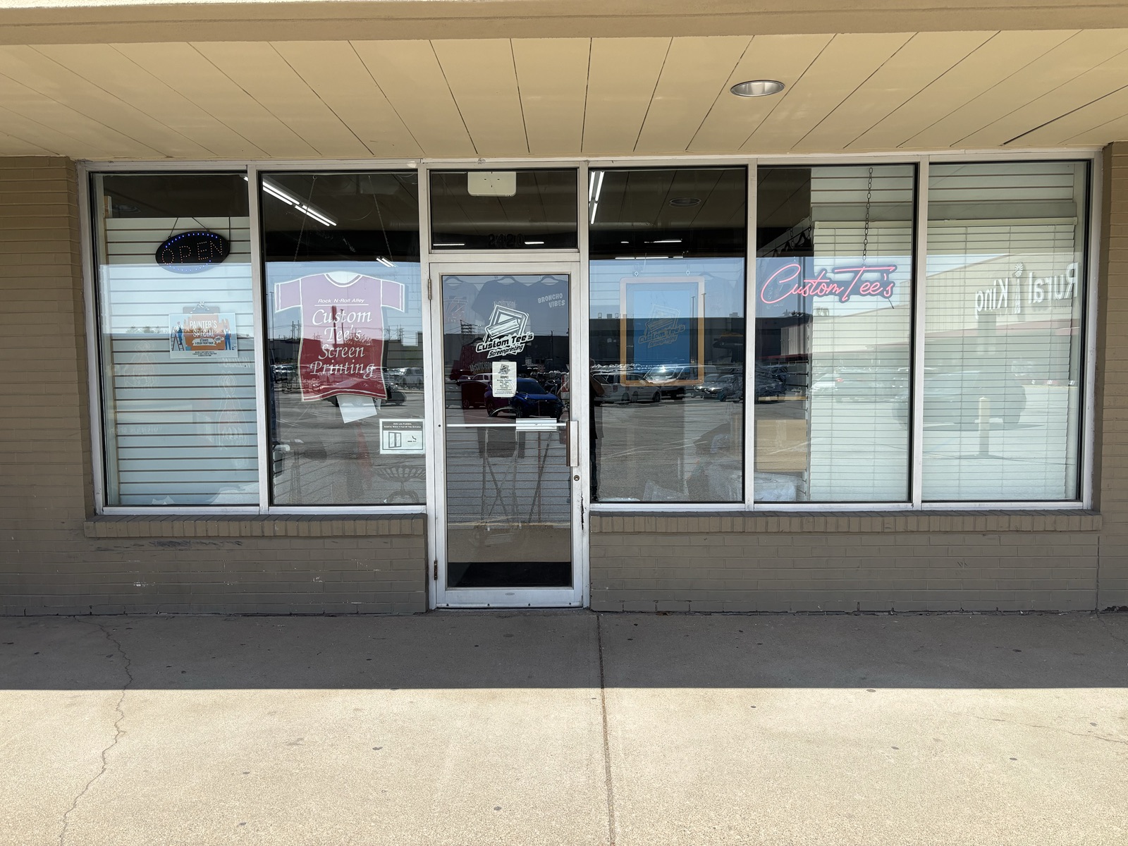 CustomTees storefront at 2420 Teal Road